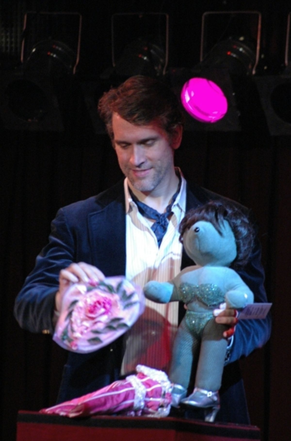 Mike McGowan showing the outfits of Louise from Gypsy at Broadway Bears XII - The Auction