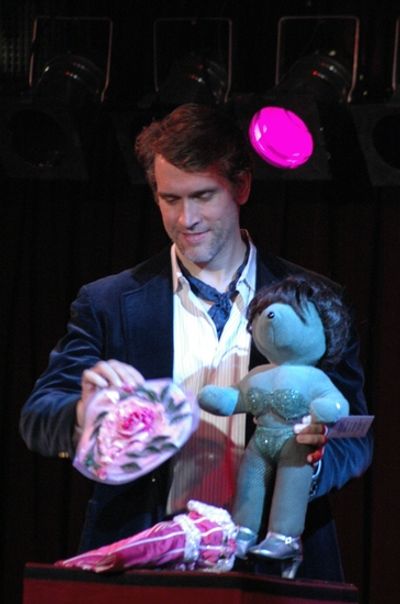 Mike McGowan showing the outfits of Louise from Gypsy Photo