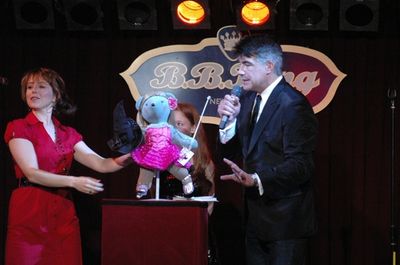Alli Mauzey and the Glinda Bear from Wicked with host Bryan Batt Photo