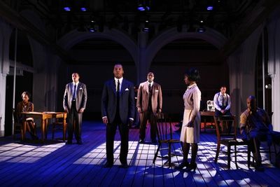 Curtis McClarin (center) and the company Photo