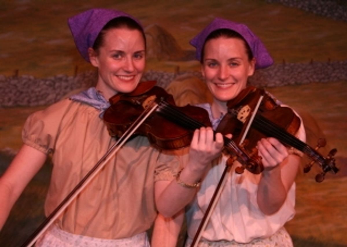 Twin violinists Alanna and Julia Tryder at 