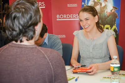 Sutton Foster is given a gift of chocolates by a fan Photo