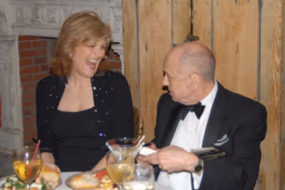 Karen Mason sharing a laugh with Charles Strouse Photo