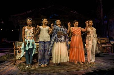 The cast of THE BLOOD QUILT takes their bows during curtain call on opening night. Pi Photo