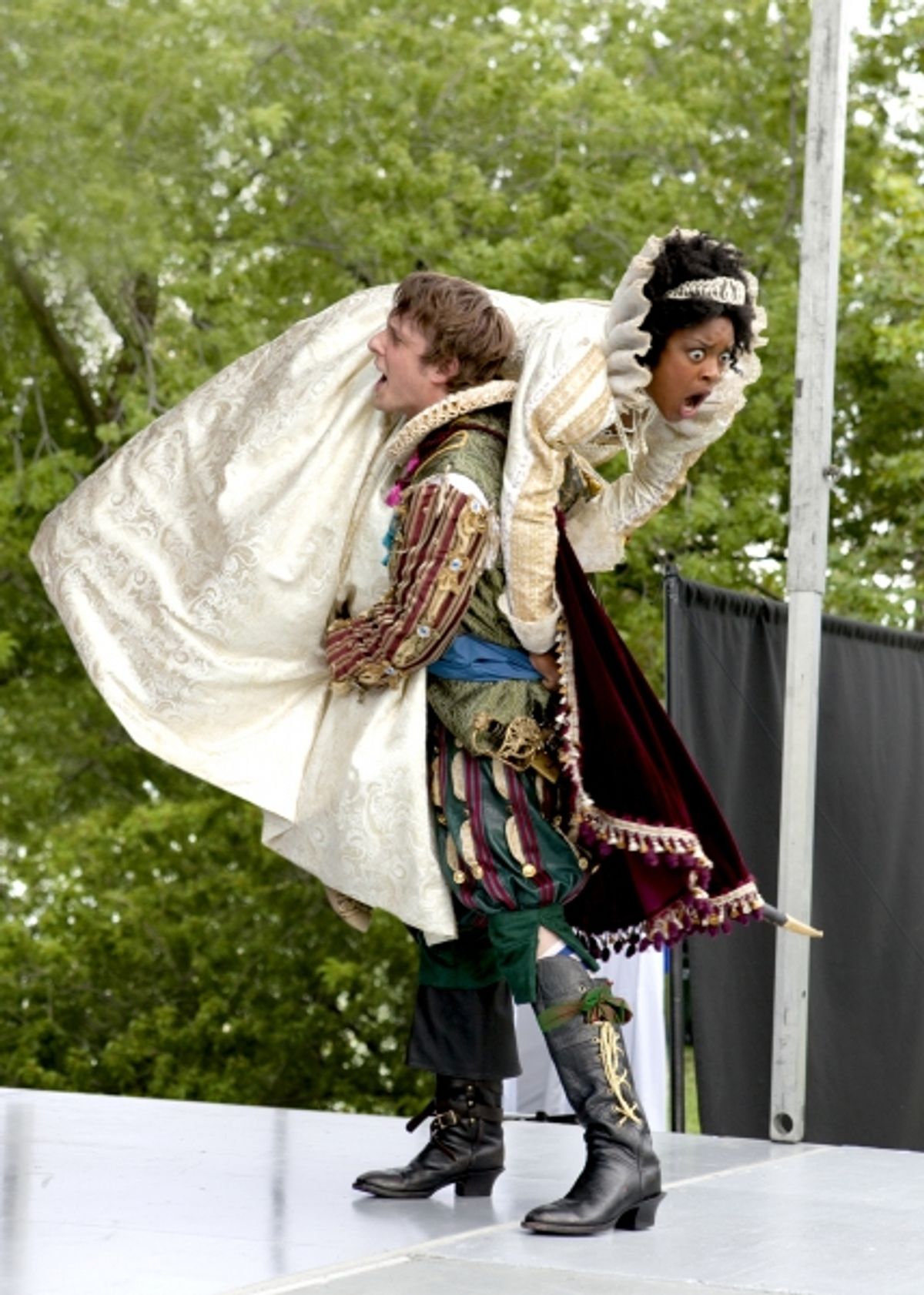 Petruchio (Matt Mueller) carries off his bride Katherina (Ericka Ratcliff). at 