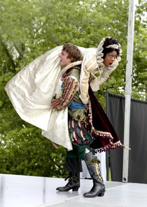Petruchio (Matt Mueller) carries off his bride Katherina (Ericka Ratcliff). Photo