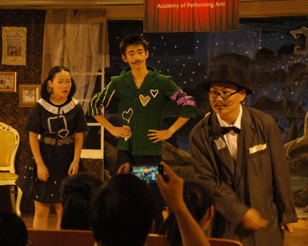 Cissy Shen as Nancy Drew, Bob Gao as Sir Henry and Alex Chi as Colonel Mustard Photo