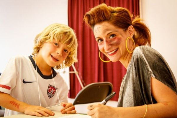 Broadway's Kat Ventura signing autographs after her Stage Make-up Workshop. Photo