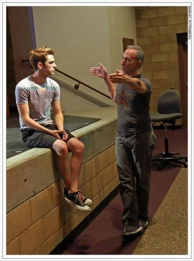 Director Noah Longton and choreographer Michael Mizerany discuss spacing of the Boyz. Photo