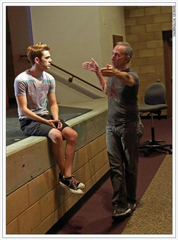 Director Noah Longton and choreographer Michael Mizerany discuss spacing of the Boyz. Photo