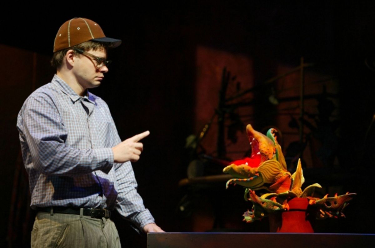 Hunter Foster as Seymour in Little Shop of Horrors. Ã¢â‚¬Å“Audrey IIÃ¢â‚¬Â puppet plant created by The Jim Henson Company. Photo: Joan Marcus. at 
