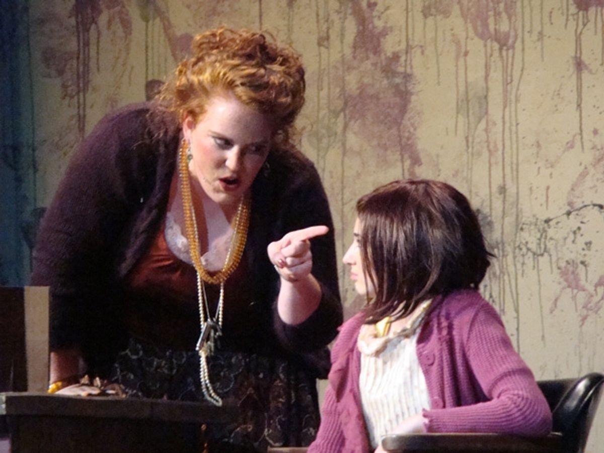                   Caitlin Hughes as Miss Hannigan, and Brigid Harrington as Annie              at 