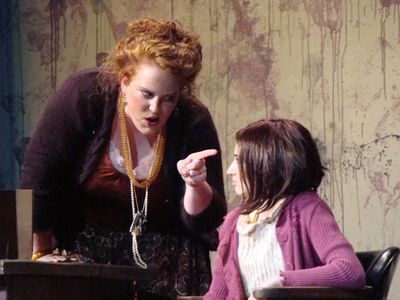                   Caitlin Hughes as Miss Hannigan, and Brigid Harrington as Annie     Photo