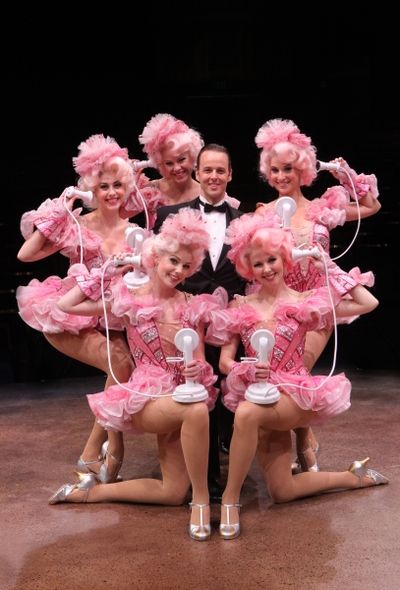 Noah Racey as Bobby Child surrounded by ensemble (right, clockwise) Robin Masella, Kr Photo