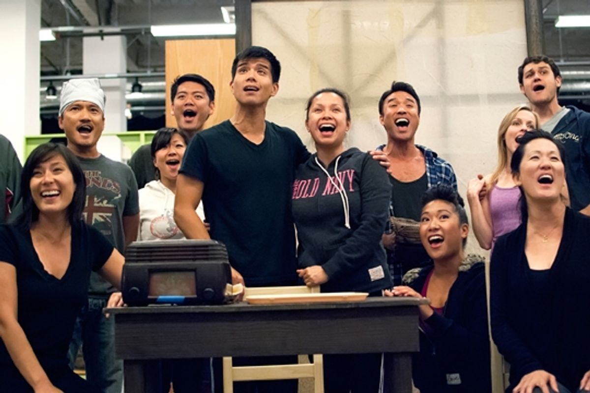 (center) Telly Leung and Lea Salonga and the cast in rehearsal for Allegiance - A New American Musical at The Old Globe in San Diego, California. The World Premiere of Allegiance, with music and lyrics by Jay Kuo and book by Marc Acito, Kuo and Lorenzo Th at 