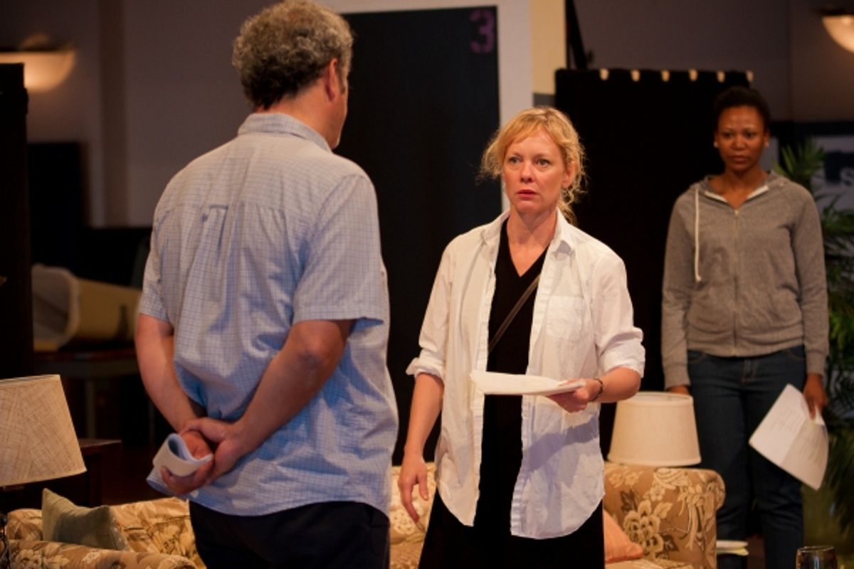  Ensemble member Mariann Mayberry (center) rehearses a scene with Keith Kupferer (left) and ensemble member Alana Arenas (right)  at 