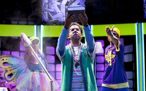G.Petto (James Johnson, center) presents the Book of Rhymes, with the Graffiti Fairy (Paige Hernandez, left) and P.Nokio (Psalmayene 24, right) @ BroadwayWorld G.Petto (James Johnson, center) presents the Book of Rhymes, with the Graffiti Fairy Photo