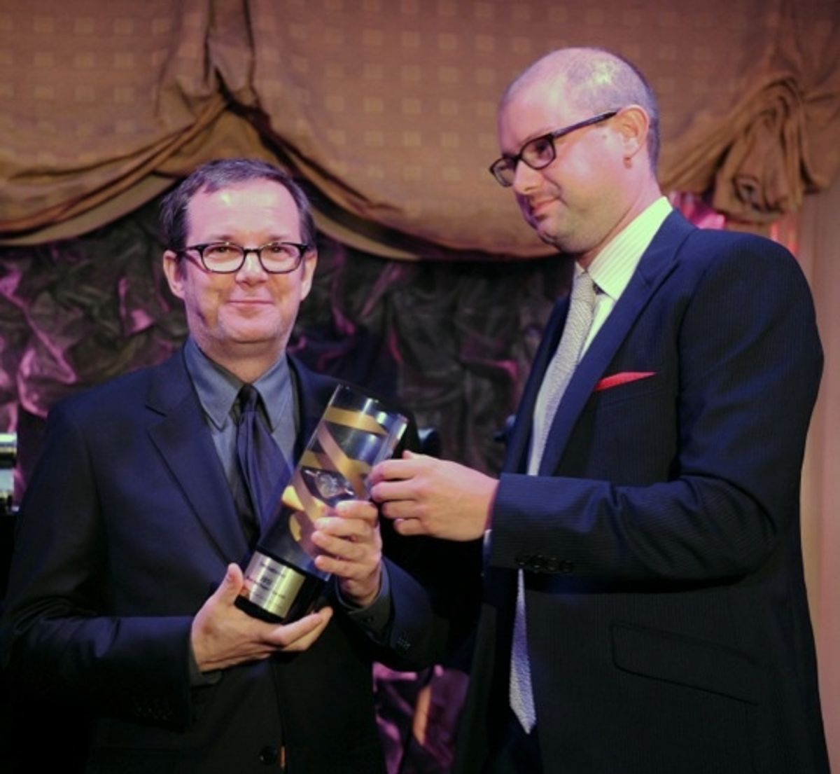  VH1 President Tom Calderone (L) accepts the 2012 Music Has PowerÃ‚Â�® Award from Institute for Music and Neurologic Function Board Member Nick Stern (R) at a celebration of musicÃ¢â‚¬â„¢s power to help and heal people with serious neurological diseases an at 