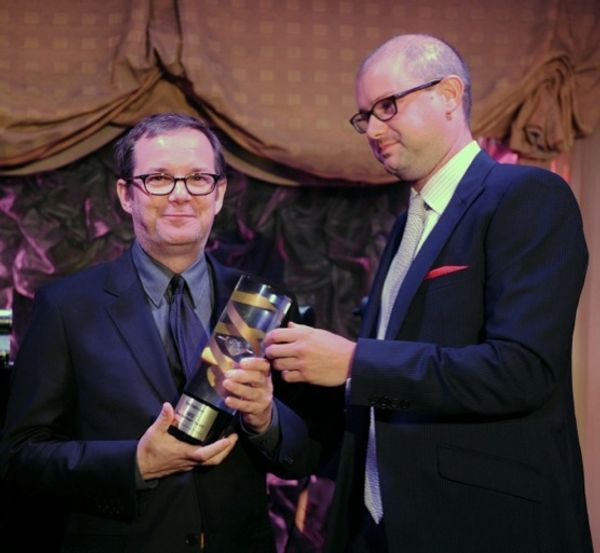  VH1 President Tom Calderone (L) accepts the 2012 Music Has PowerÃ‚Â® Award from Photo