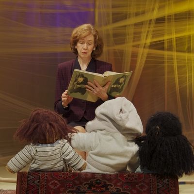  Mary Ewald as Laura Bush reads to dead Iraqi children in Paradise Photo