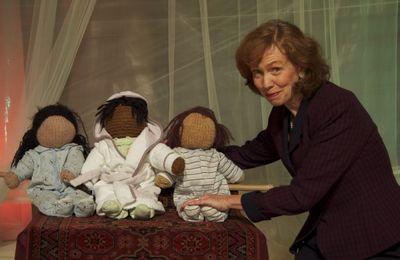  Mary Ewald as Laura Bush reads to dead Iraqi children in Paradise Photo