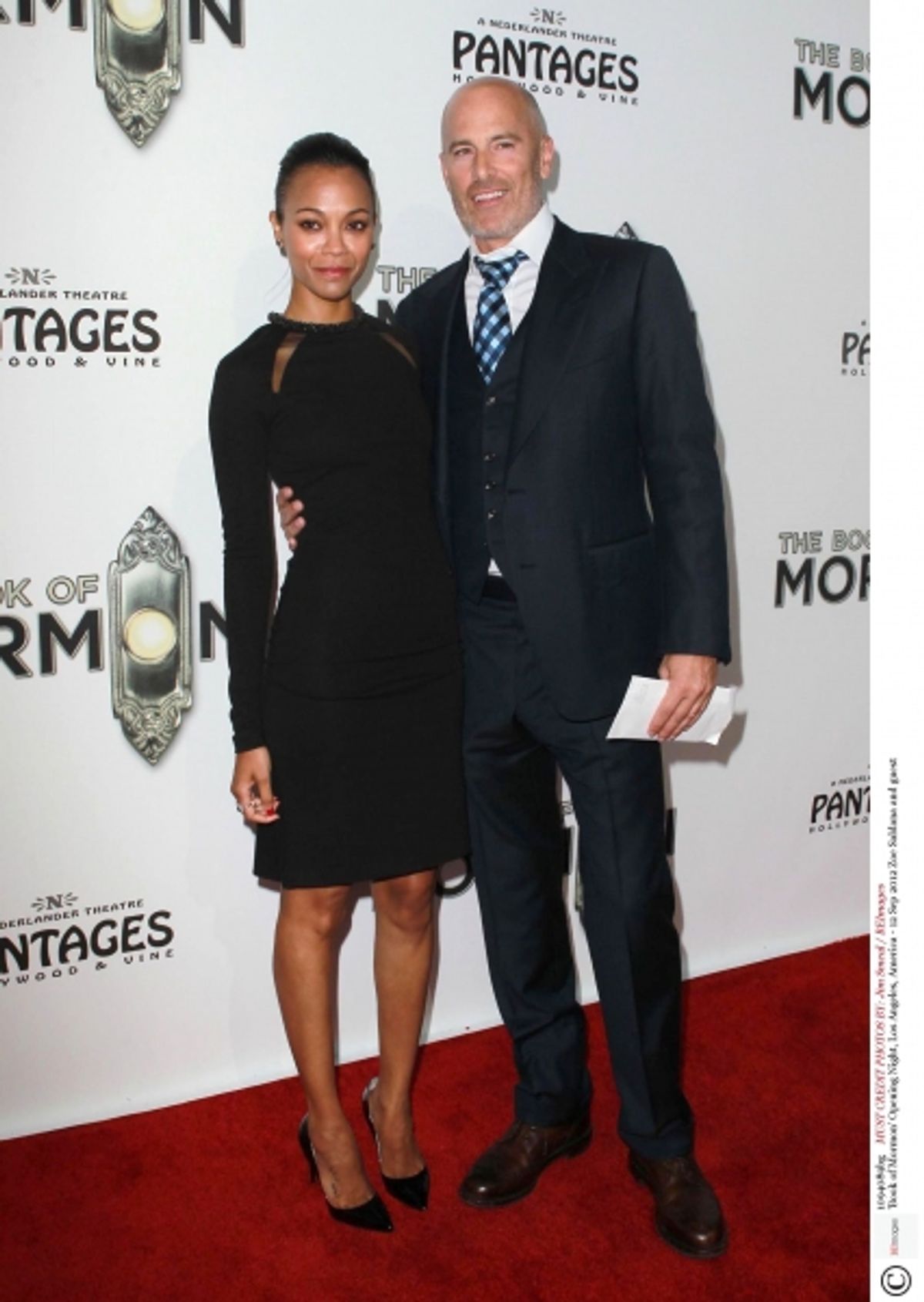 Mandatory Credit: Photo by Jim Smeal / BEImages (1094089bg)Zoe Saldana and guest'Book of Mormon' Opening Night, Los Angeles, America - 12 Sep 2012 at 