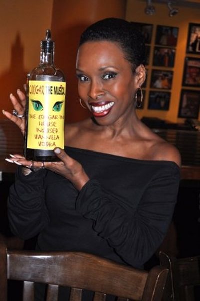Brenda Braxton poses with the Cougartini's Special ingrediant (Vanilla Vodka and Pom  Photo