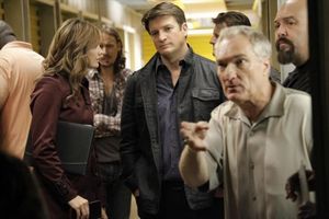STANA KATIC, NATHAN FILLION, DENNIS COCKRUM Photo