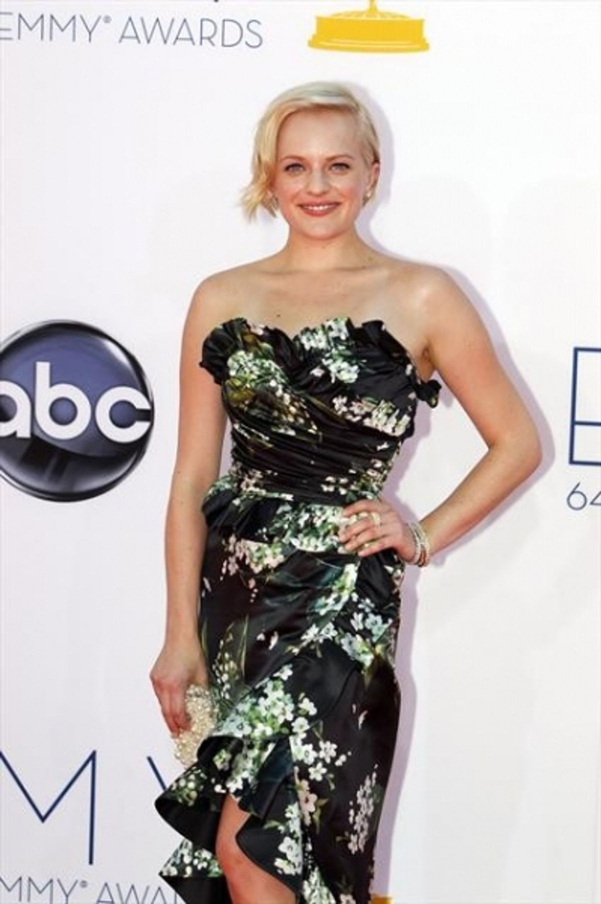  THE 64TH PRIMETIME EMMY(r) AWARDS - The 64th Primetime Emmy Awards broadcasts live from 8:00-11:00 p.m., ET/5:00-8:00 p.m., PT., Sunday, September 23, 2012 exclusively on ABC. (ABC/RICK ROWELL)ELISABETH MOSS at 