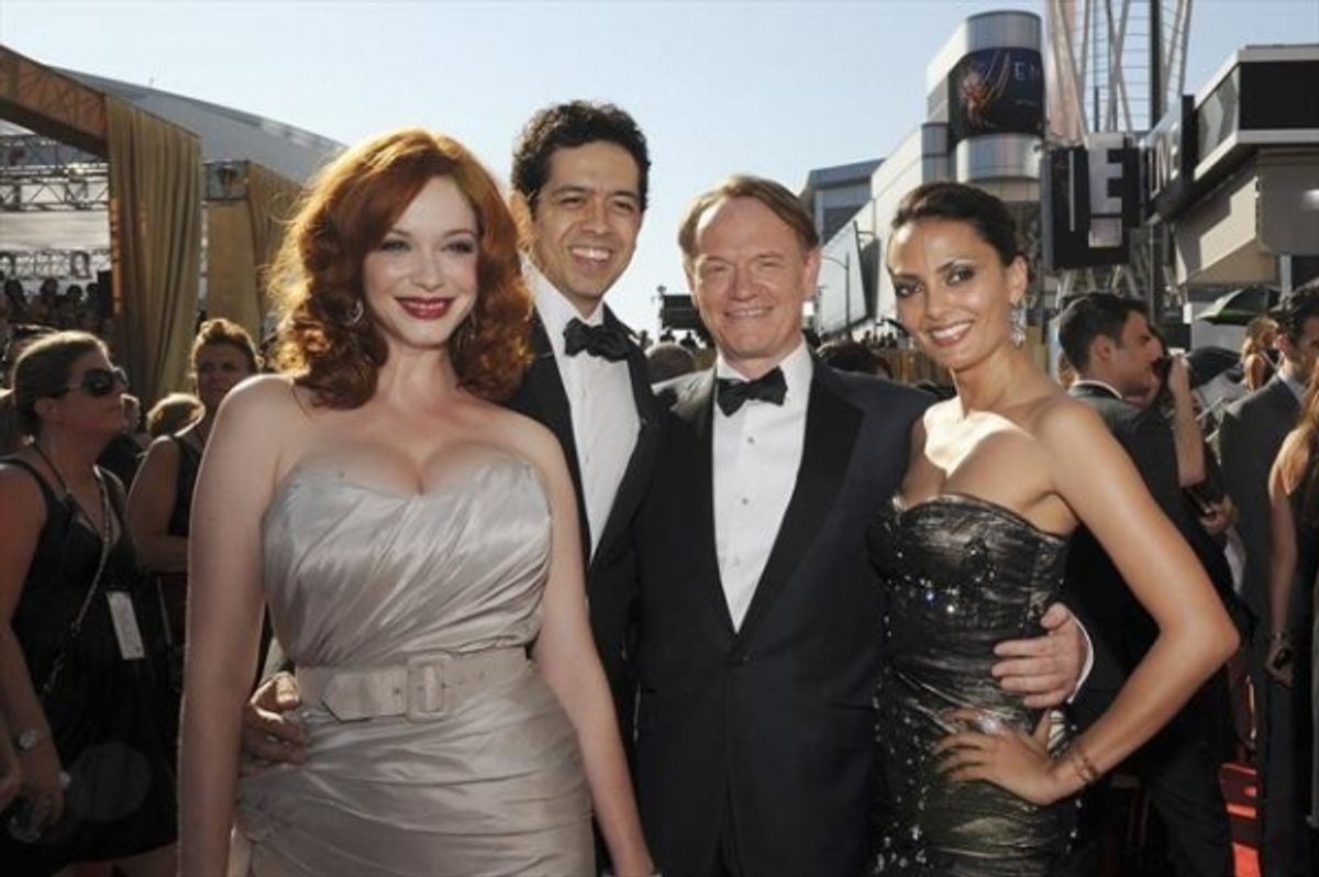  THE 64TH PRIMETIME EMMY(r) AWARDS - The 64th Primetime Emmy Awards broadcasts live from 8:00-11:00 p.m., ET/5:00-8:00 p.m., PT., Sunday, September 23, 2012 exclusively on ABC. (ABC/MATT PETIT)CHRISTINA HENDRICKS, GEOFFREY AREND, JARED HARRIS at 