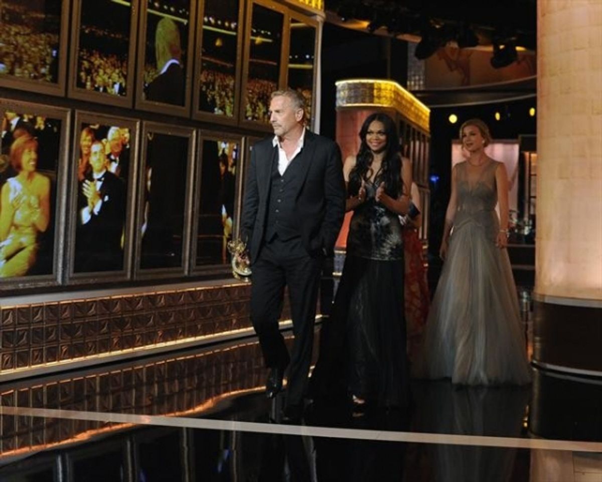  THE 64TH PRIMETIME EMMY(r) AWARDS - The 64th Primetime Emmy Awards broadcasts live from 8:00-11:00 p.m., ET/5:00-8:00 p.m., PT., Sunday, September 23, 2012 exclusively on ABC. (ABC/MATT BROWN)KEVIN COSTNER, EMILY VANCAMP at 