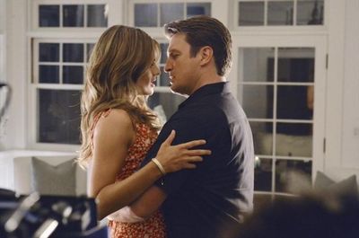 STANA KATIC, NATHAN FILLION Photo