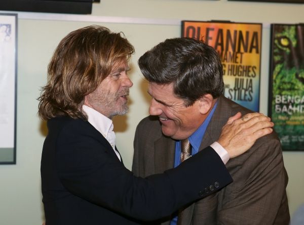 From left, actor William H. Macy and cast member Rod McLachlan hug backstage after th Photo