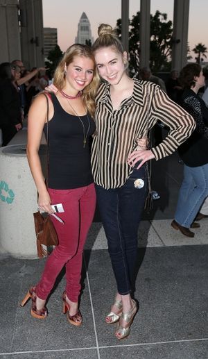 From left, Lindsey Bushman and Spencer Locke pose during the arrivals for the opening Photo