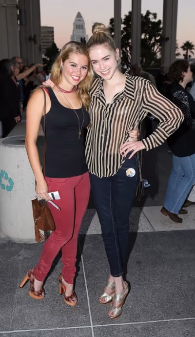 From left, Lindsey Bushman and Spencer Locke pose during the arrivals for the opening Photo