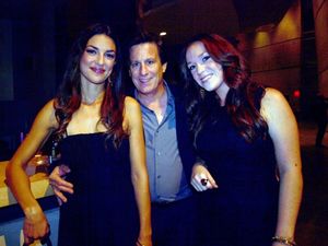 Backup singers Laura Carbonell and Alison Cusano pose with an audience member @ BroadwayWorld Backup singers Laura Carbonell and Alison Cusano pose with an audience member Photo