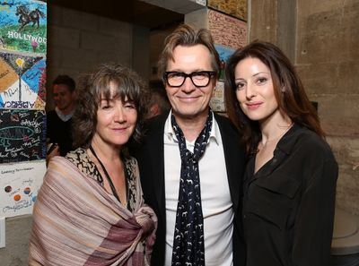 From left, Anwen Rees-Myers, actor Gary Oldman and wife Alexandra Edenborough pose ba Photo