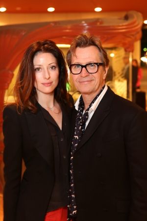 From left, Alexandra Edenborough and actor Gary Oldman pose during the arrivals for t Photo