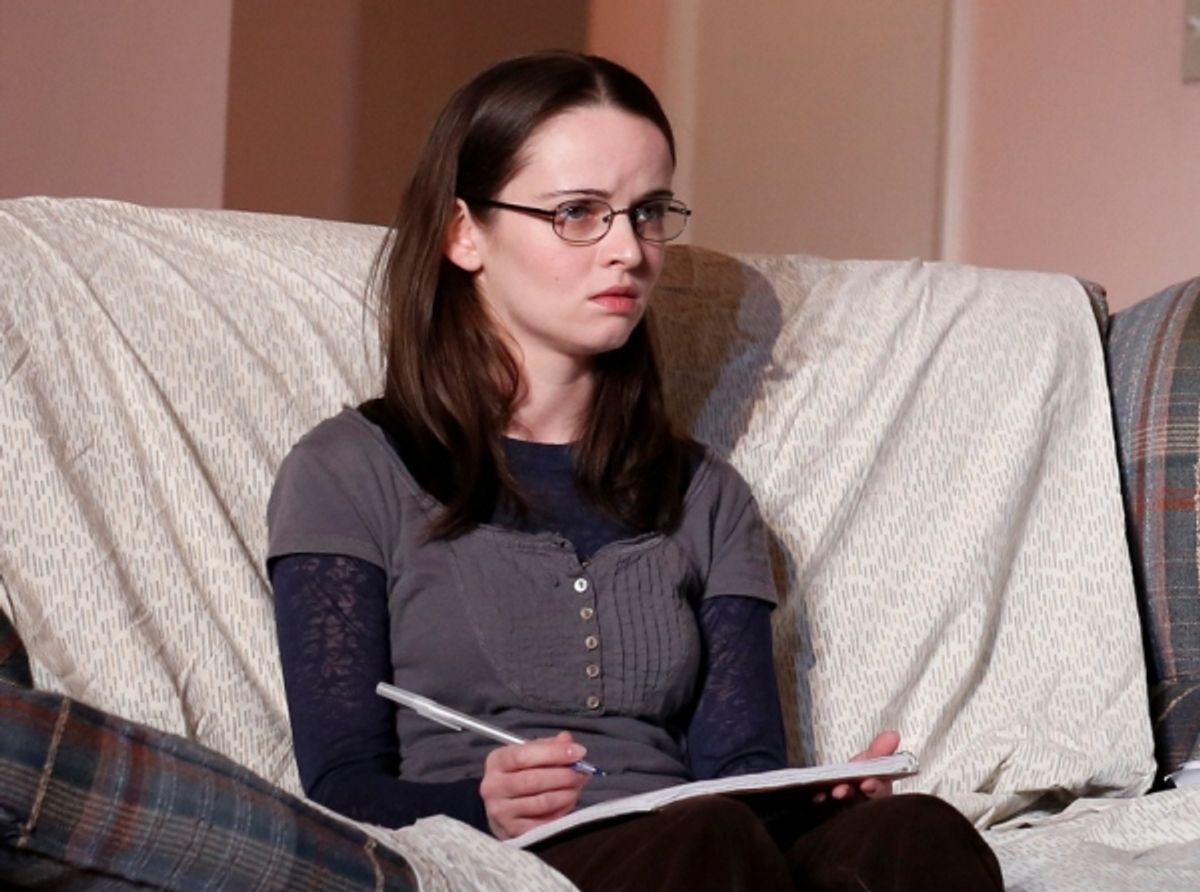 Reyna de Courcy as Ellie at 