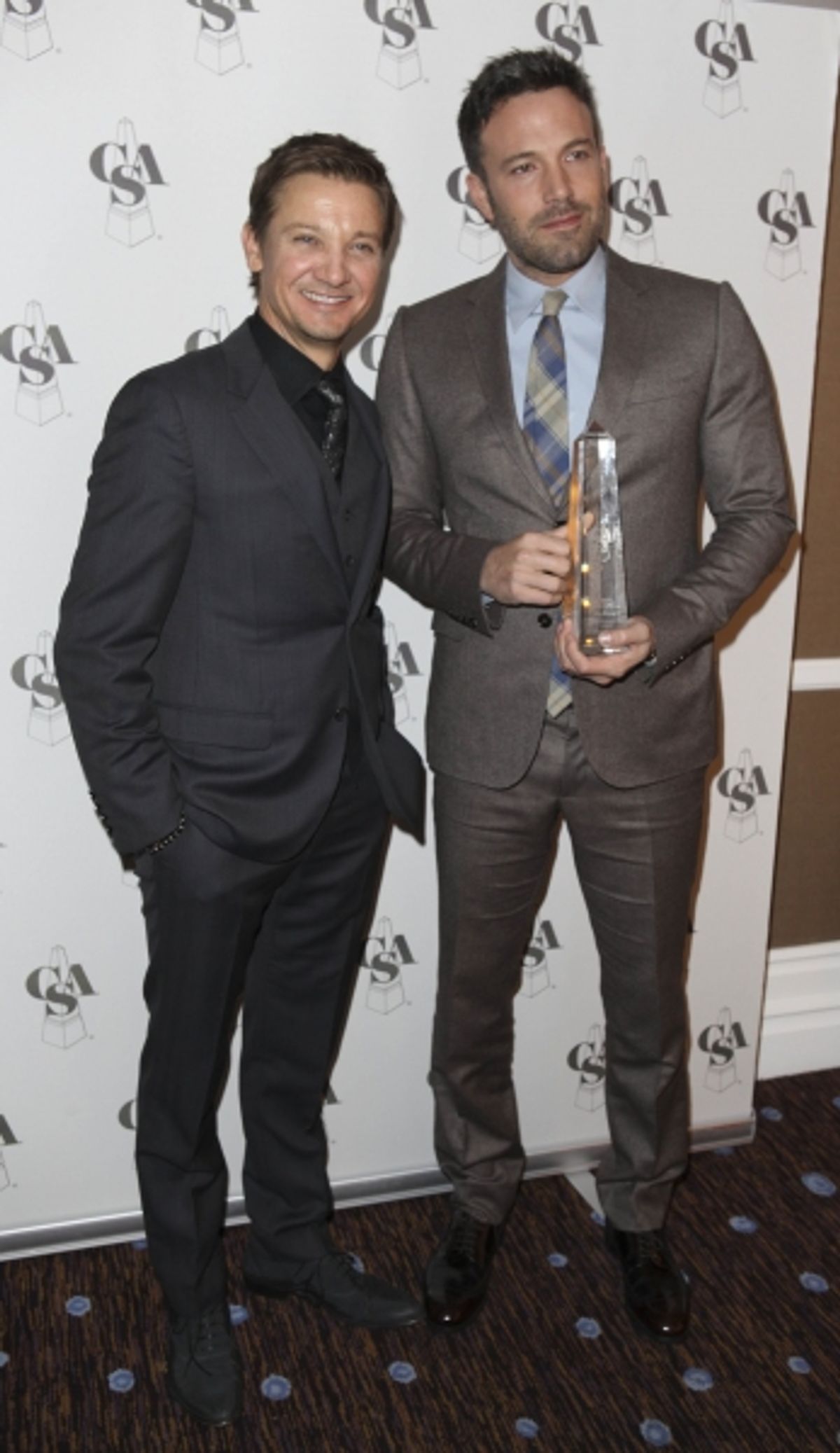 From left, actors Jeremy Renner and Ben Affleck, Career Achievement Award winner, pose backstage during the 2012 Casting Society of America Artios Awards held at the Beverly Hilton Hotel on Monday Oct. 29, 2012 in Beverly Hills, Calif. (Photo by Ryan Mill at 