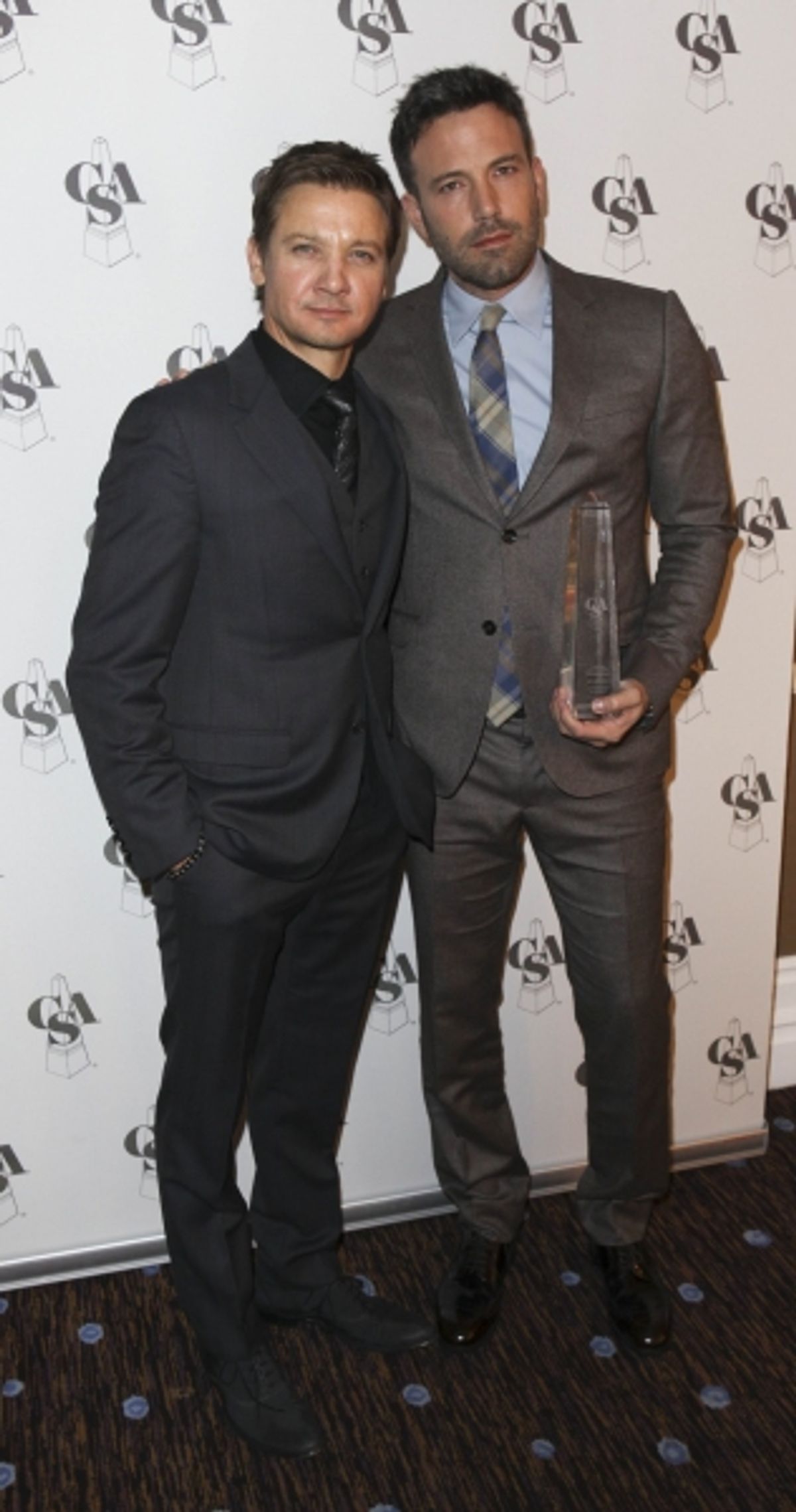 From left, actors Jeremy Renner and Ben Affleck, Career Achievement Award winner, pose backstage during the 2012 Casting Society of America Artios Awards held at the Beverly Hilton Hotel on Monday Oct. 29, 2012 in Beverly Hills, Calif. (Photo by Ryan Mill at 