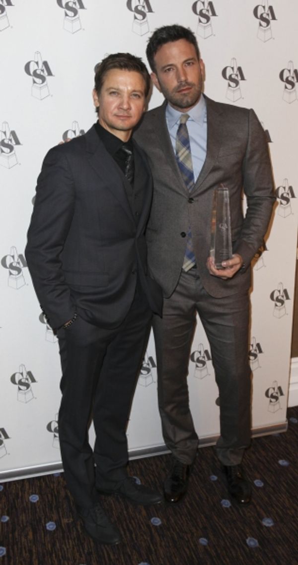 From left, actors Jeremy Renner and Ben Affleck, Career Achievement Award winner, pos Photo