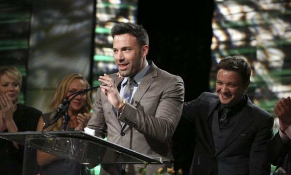 From left, Ben Affleck, Career Achievement Award winner and presenter Jeremy Renner d Photo