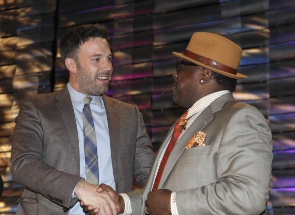 From left, Ben Affleck, Career Achievement Award winner is congratulated by Cedric th Photo