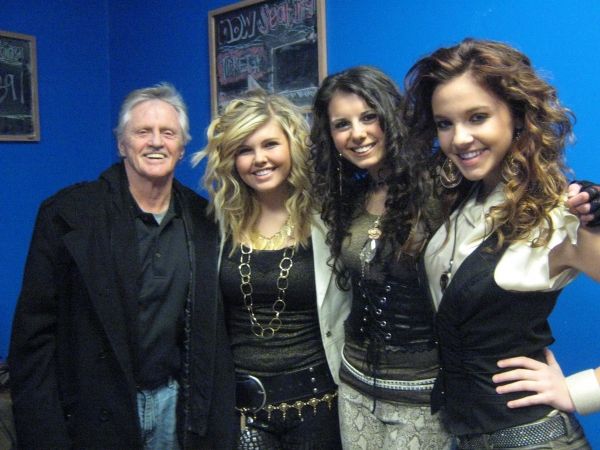 Play It Forward founder Gary Burbank with Jetset Getset singers Tori Little, Sadie Lo Photo