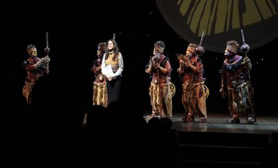 Julie Taymor and the cast of The Lion King Photo