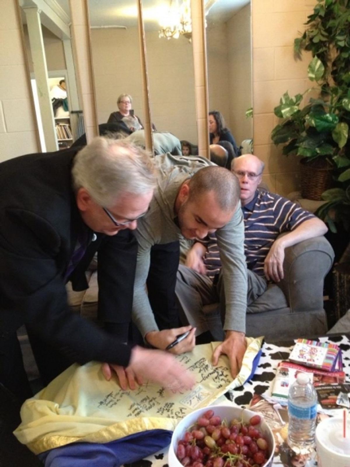 Jeffrey Ellis and Bralyn Stokes (with Lane Wright looking on) at 