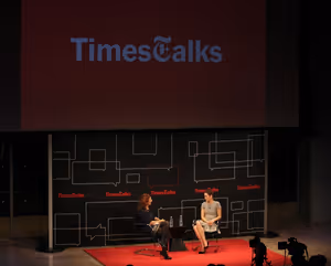 Moderator Melena Ryzik with Marion Cotillard Photo