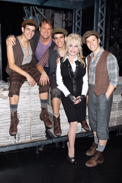 -New York, NY - 11/28/12 - Dolly Parton Visits the Cast of NEWSIES after catching the Photo