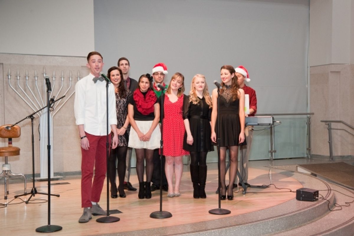  'Sleigh Bells' Jp Qualters with Alexandra Ferrara, Alexandra Cutler, Mollie McComb, Megan Morgan, Brittney Bertier, Norman Leung, Jason Evans, and Joel Dommel at 